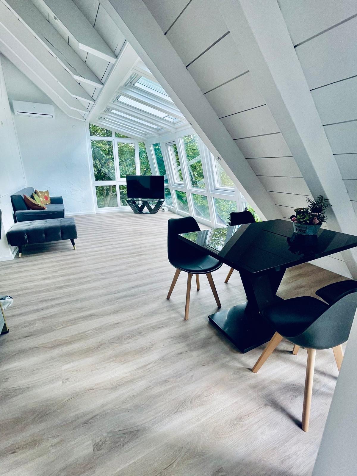The Riverside Loft lounge and dining